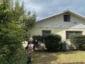 Corner-Construction-Park-Avenue-Before-and-After-HomeRenovations-YardBackofHouse